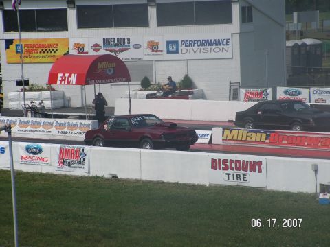 1988 Ford Mustang - Two cars, including a 1988 Ford Mustang, compete at Milan Dragway on June 17, 2007.