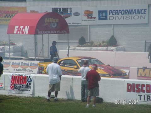 1988 Ford Mustang - Drag racing car at Milan Dragway, likely a Ford Mustang from the 2005-2014 generation.