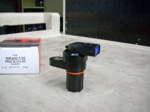 1992 Ford Bronco - A Motorcraft sensor part is shown next to its packaging.