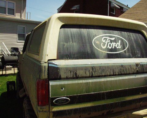 1989 Ford Bronco - This 1989 Ford Bronco is viewed from the rear, showing its distinctive body style and Ford badging.