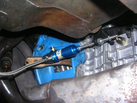 1975 Ford Ranchero - This photo shows a close-up view of the clutch slave cylinder and part of the transmission housing.