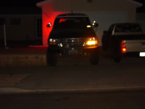 1994 Ford Bronco - Front view of a 1992 Ford Bronco parked in a driveway at night.