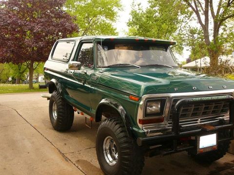 1978 Ford Bronco - This 1978 Ford Bronco features a custom flame paint job and a heavy-duty brush guard.