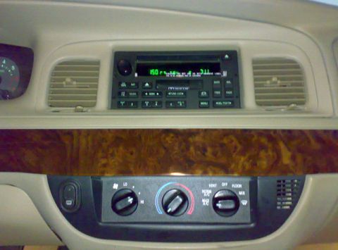 2007 Mercury Grand Marquis - Interior view of a car's dashboard, showing the radio and climate control panel.
