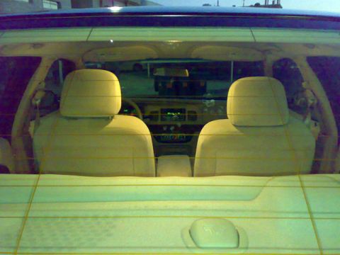 2007 Mercury Grand Marquis - Interior view of a 2007 Mercury Grand Marquis, showing the dashboard and front seats.