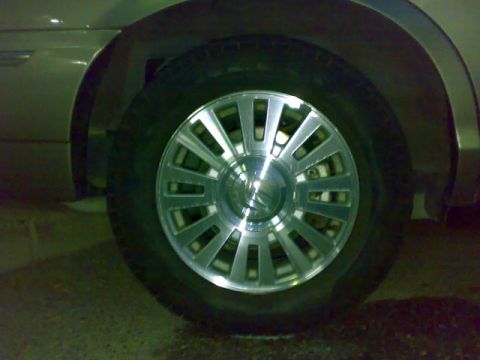 2007 Mercury Grand Marquis - The wheel of a 2007 Mercury Grand Marquis is shown.