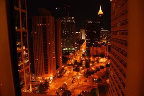 1996 Ford Bronco - A view of a city at night, with lights from buildings and street lamps illuminating the urban landscape.