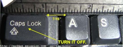 1991 Ford Bronco - A close-up of keyboard keys shows a measurement of 7/16 inches between the Caps Lock and A keys.