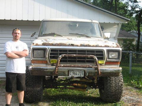 1978 Ford Bronco - This 1978 Ford Bronco has a prominent brush guard and is lifted with large off-road tires.