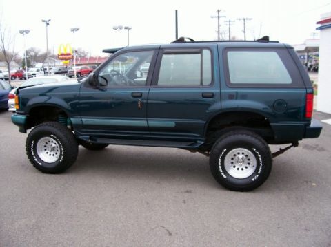 1994 Ford Explorer - This lifted 1994 Ford Explorer is presented in a side profile, its off-road modifications.
