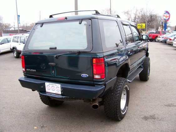 1994 Ford Explorer, rear view, lifted suspension, off-road tires
