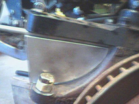 1991 Ford Bronco - A close-up view of vehicle suspension components, including a brake rotor.