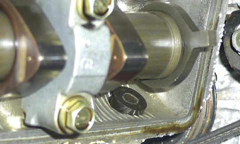 1997 Ford Taurus - Engine internal components, likely a camshaft and valve cover, are visible in this close-up shot.