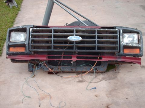 1982 Ford Bronco - Front clip from a Ford Bronco, likely from the early 1980s, showing the grille and headlights.