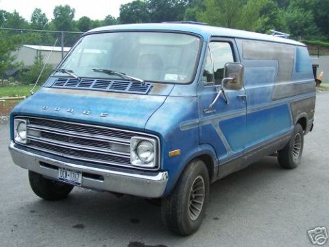 1978 Ford E250 - This blue van displays 'DODGE' badging on its grille, indicating it is not a 1978 Ford E250.