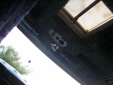 1978 Ford E250 - Interior view of a van showing the headliner, skylight, and overhead console.