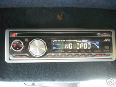 1978 Ford E250 - A JVC car stereo is mounted in the dashboard, displaying "NO IPOD" on its screen.