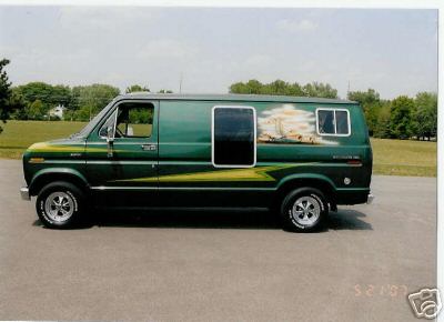 1978 Ford E250 - Side view of a green 1978 Ford E250 van custom paint and graphics.