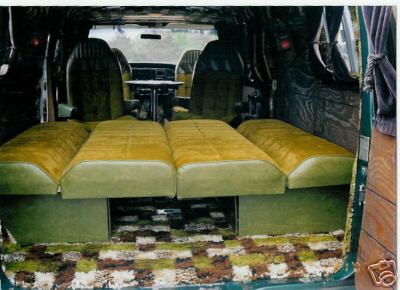 1978 Ford E250 - Van interior features fold-out beds and unique carpet patterns.