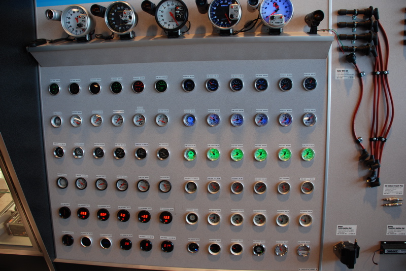 Display of automotive gauges and spark plug wires