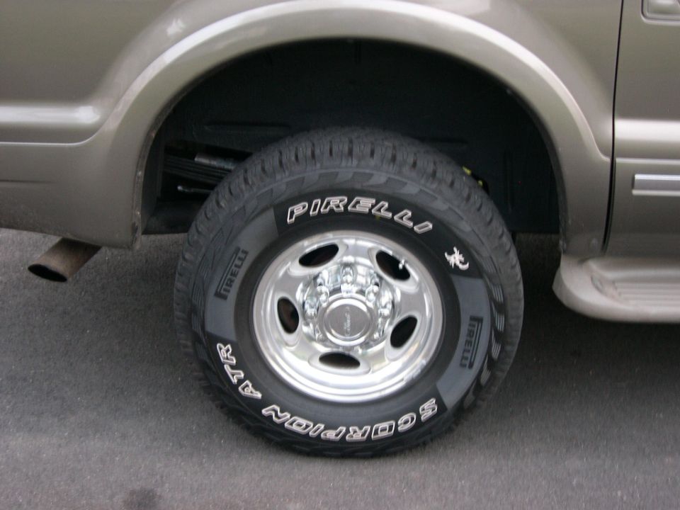 2" lift from Modified F codes using "Towrigs" 3rd spring from the old pack modification.