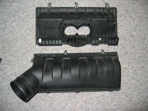 1996 Dodge 2500 - Air cleaner housing parts shown separately on carpet.