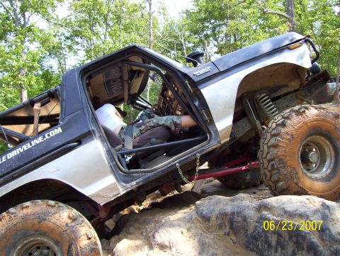 1978 Ford Bronco - This heavily modified 1978 Ford Bronco is shown navigating a rocky off-road course.