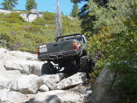 1986 Ford Bronco - This 1986 Ford Bronco is navigating a challenging rocky trail.