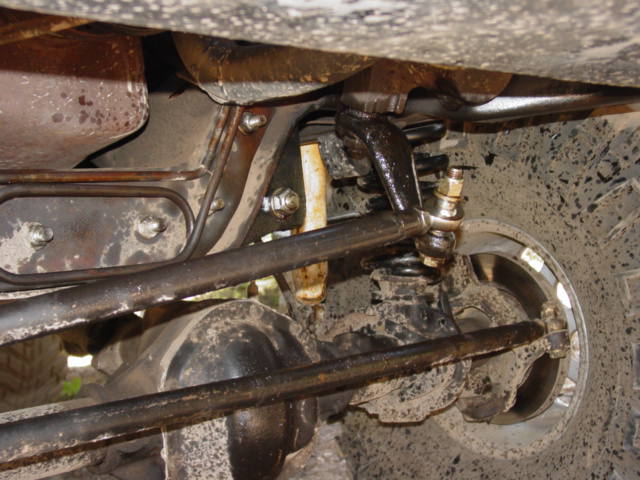 1986 Ford Bronco front suspension and steering linkage, showing tie rod and drag link