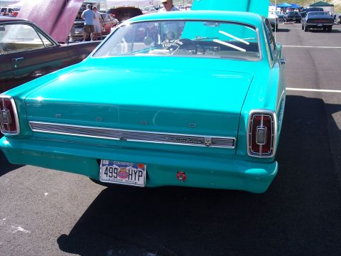 1972 Ford Ranchero - Rear view of a teal 1966 Ford Ranchero with a Colorado license plate.