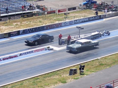 1972 Ford Ranchero - Two cars race down Bandimere Speedway, with a green and white 1959 model in the foreground.