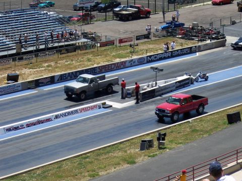 1972 Ford Ranchero - Two pickup trucks prepare for a race at Bandimere Speedway.