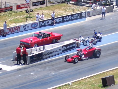 1972 Ford Ranchero - Drag racing event with multiple vehicles preparing for a race.
