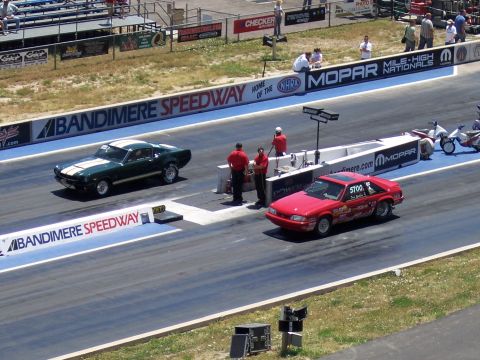 1972 Ford Ranchero - Two muscle cars prepare for a drag race at Bandimere Speedway.