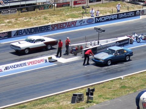 1972 Ford Ranchero - Two cars prepare for a drag race at Bandimere Speedway, with one appearing to be a 1972 model.