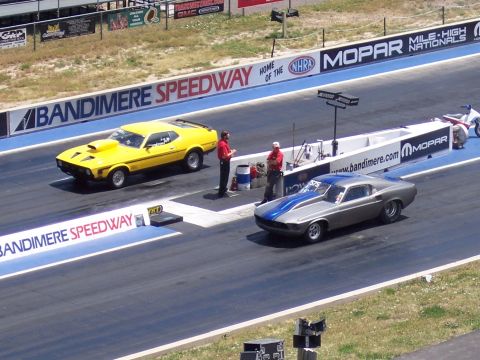 1972 Ford Ranchero - Two muscle cars are staged at Bandimere Speedway for a drag race.