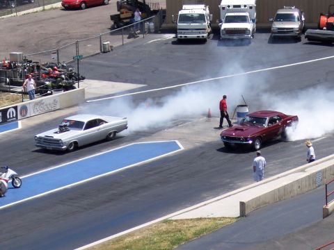 1972 Ford Ranchero - Drag cars warm up tires with burnouts before a race at Bandimere Speedway.