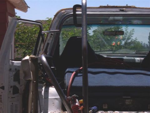 1995 Ford Bronco - Roll cage installed inside the interior of a 1995 Ford Bronco.