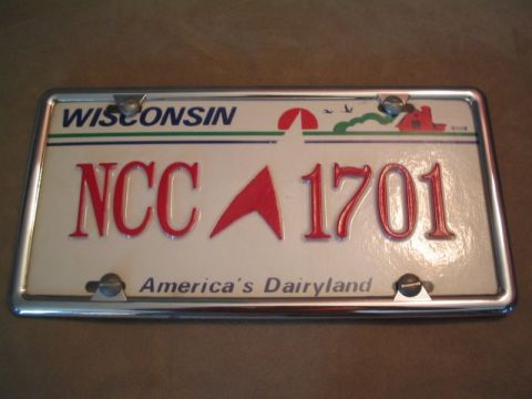 1998 Ford Crown Victoria - A Wisconsin license plate with the characters NCC 1701 is shown.