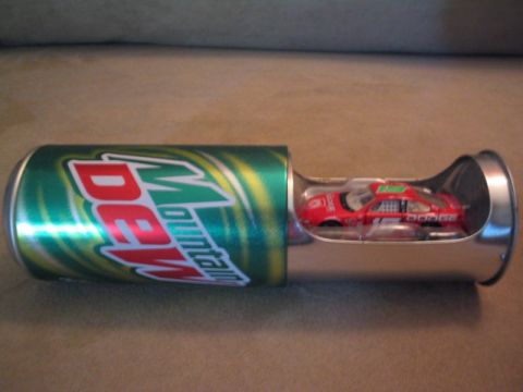 1998 Ford Crown Victoria - A small toy race car is visible inside a cut-open Mountain Dew can.