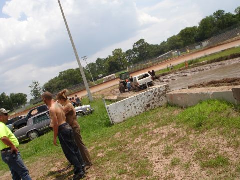 1989 Ford Bronco - Mud bog event at Putnam Speedway on June 24, 2007, with spectators and vehicles.