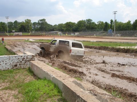 1989 Ford Bronco - A 1989 Ford Bronco navigates a muddy track at Putnam Speedway on June 24, 2007.