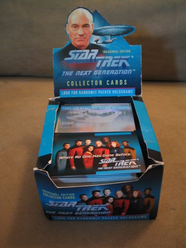 Star Trek: The Next Generation collector card box with images of the cast