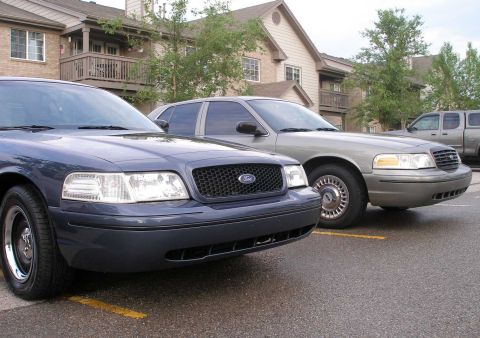 1998 Ford Crown Victoria - Before: The current appearance with the OEM style headlamps and clear corner lamps. The Colonel's '99 P71 is in the background.