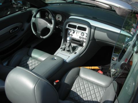 1998 Ford Crown Victoria - Interior view of a car's cabin, showing the dashboard, seats, and gear shifter.