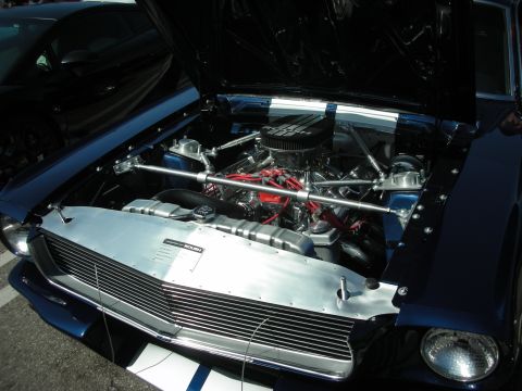 1998 Ford Crown Victoria - Customized 1967 Ford Mustang engine bay, a V8 engine and racing stripes.