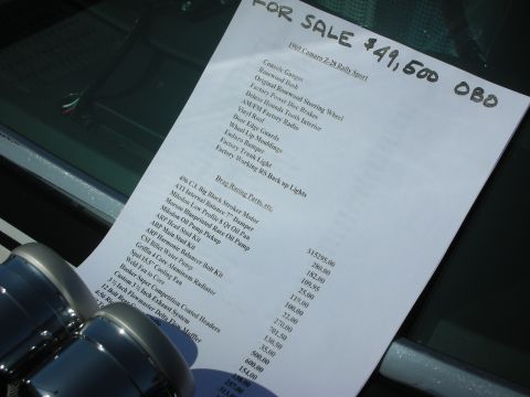 1998 Ford Crown Victoria - FOR SALE windshield sign for a 1969 Camaro Z28 listing options and a priced racing-parts list.