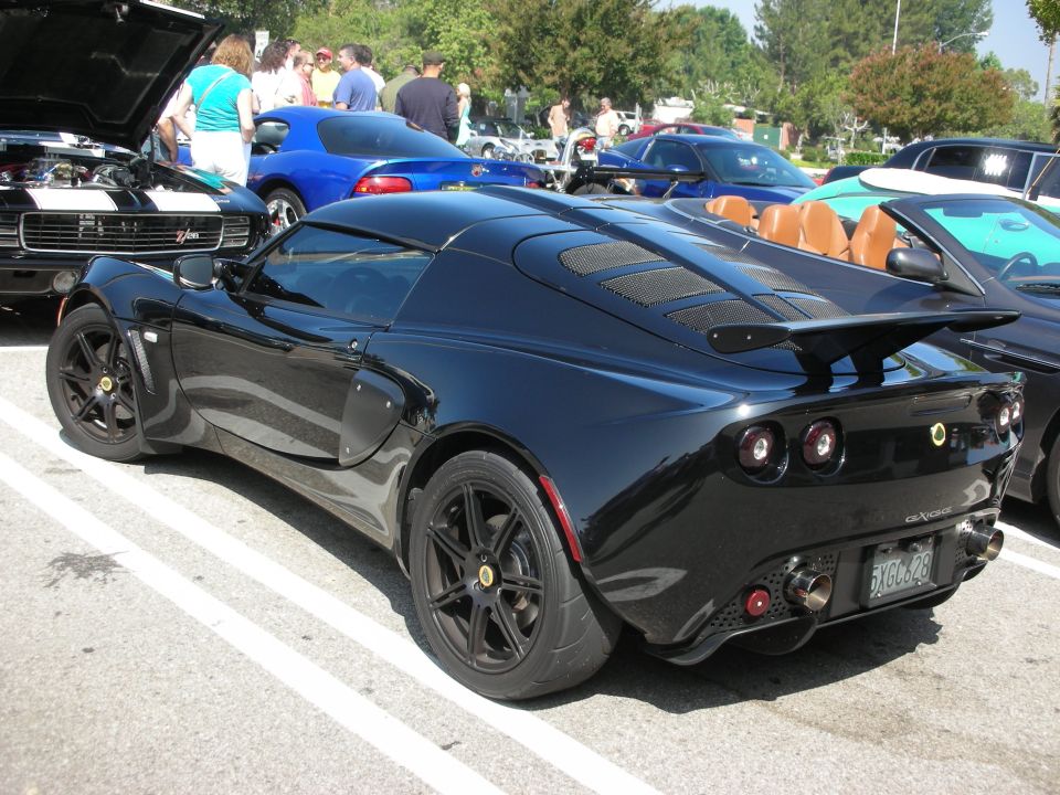 Black Lotus Elise rear view with custom exhaust and license plate 5YGC628