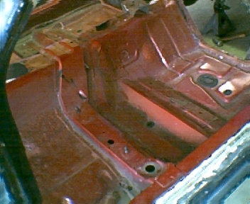 1966 Ford Ranchero - The interior floor pan of a vehicle is shown, possibly during a restoration project.