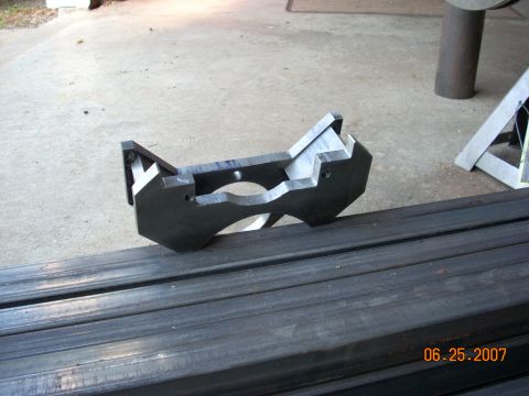 2000 Chevrolet Tahoe - A metal bracket part is shown resting on a stack of metal bars, with a date stamp indicating it was photographed in 2007.